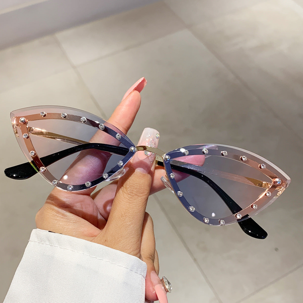 Wholesale Colorful rimless diamond cat-eye sunglasses