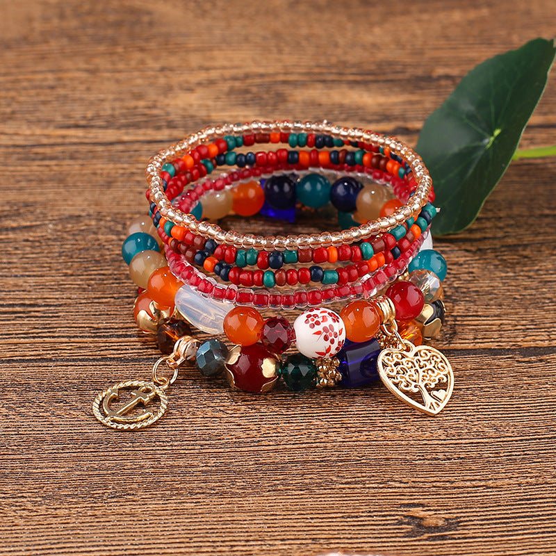 Pulsera con cuentas de múltiples colgantes cuidadas al por mayor