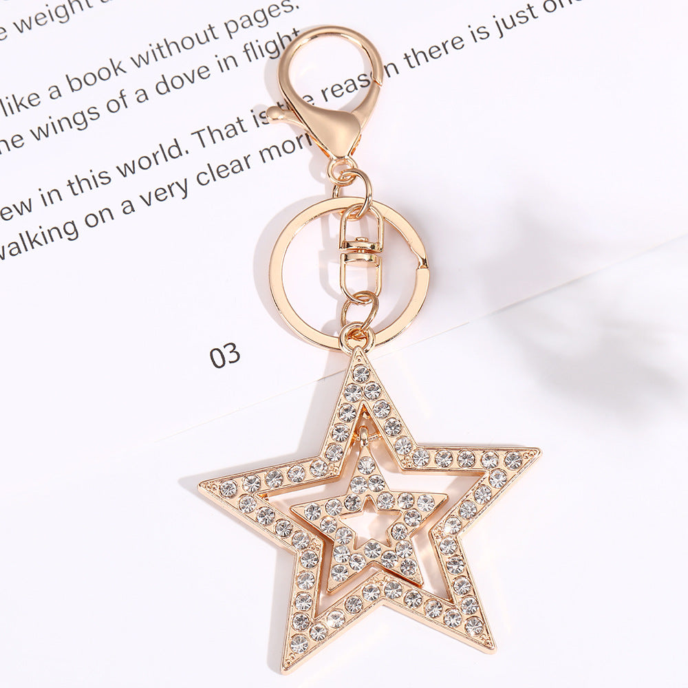 Wholesale Five pointed star hollow diamond inlaid metal keychain