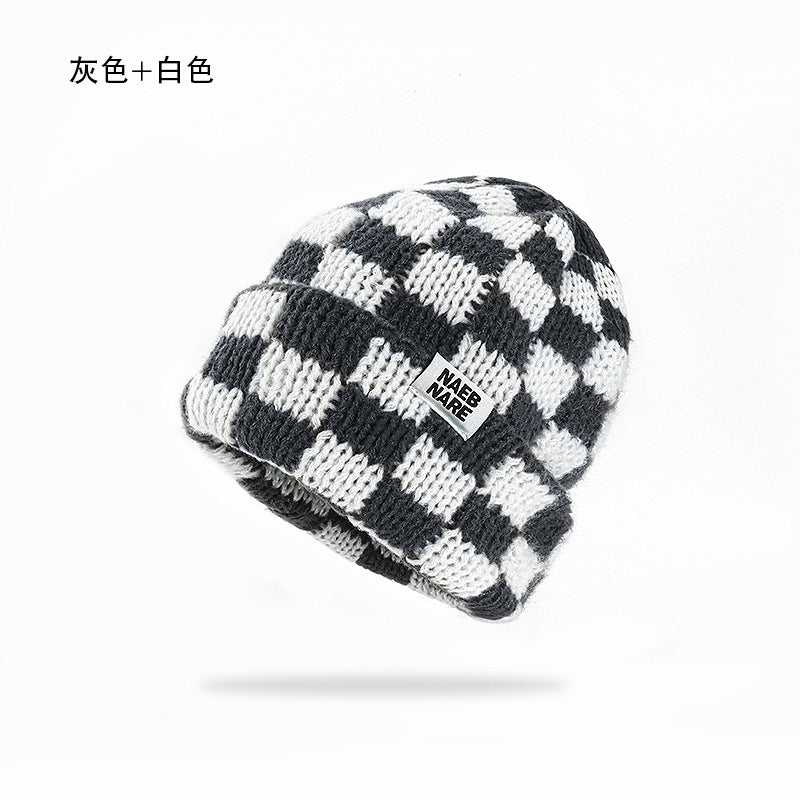 Wholesale Checkerboard plaid knitted hat women' s autumn and winter face-revealing small warm hat