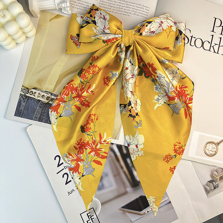 Wholesale Retro Camellia Red Big Bow Long Floating Hair Clip