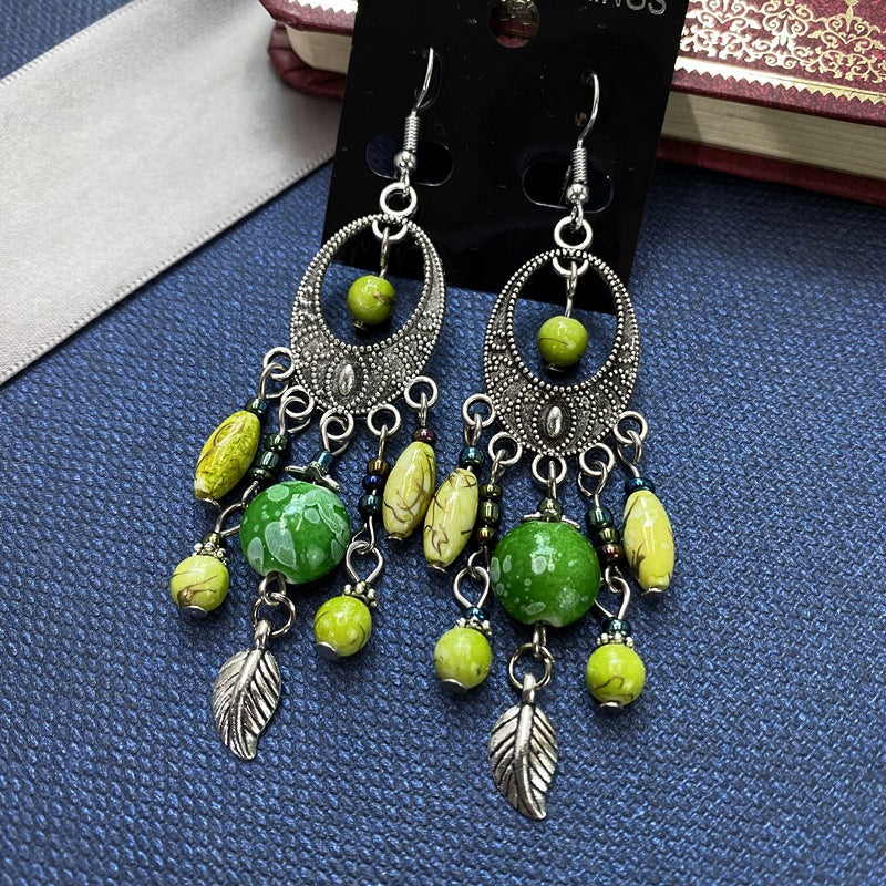Wholesale Bohemian Retro Ethnic Style Ancient Silver Goddess Jewelry Face Skinny Tassel Long Earrings