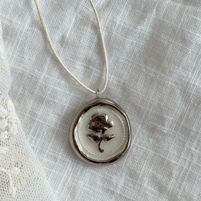 Wholesale rabbit flower print pendant stainless steel necklace