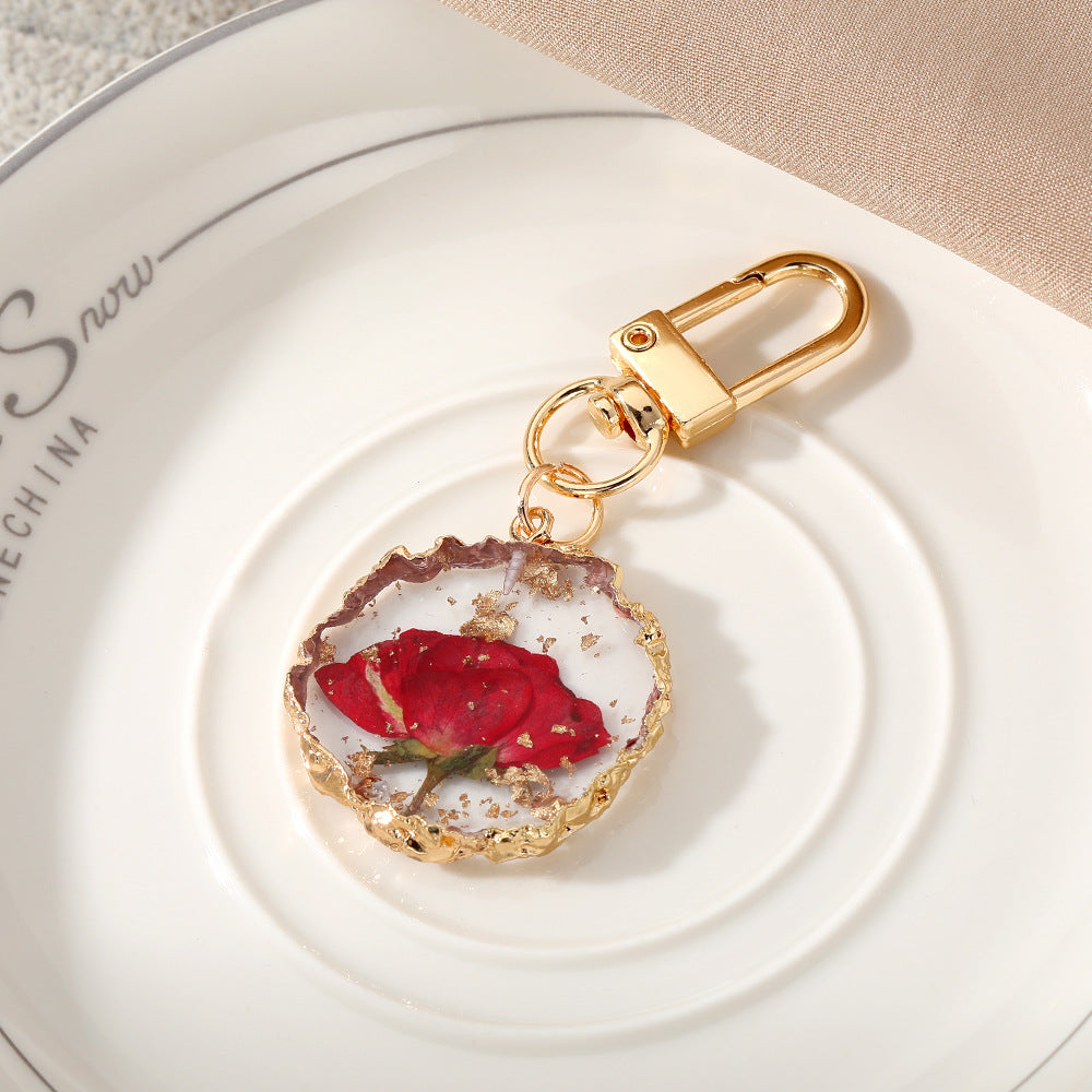 Wholesale Creative Frosted Epoxy Dried Flower December Flower Keychain