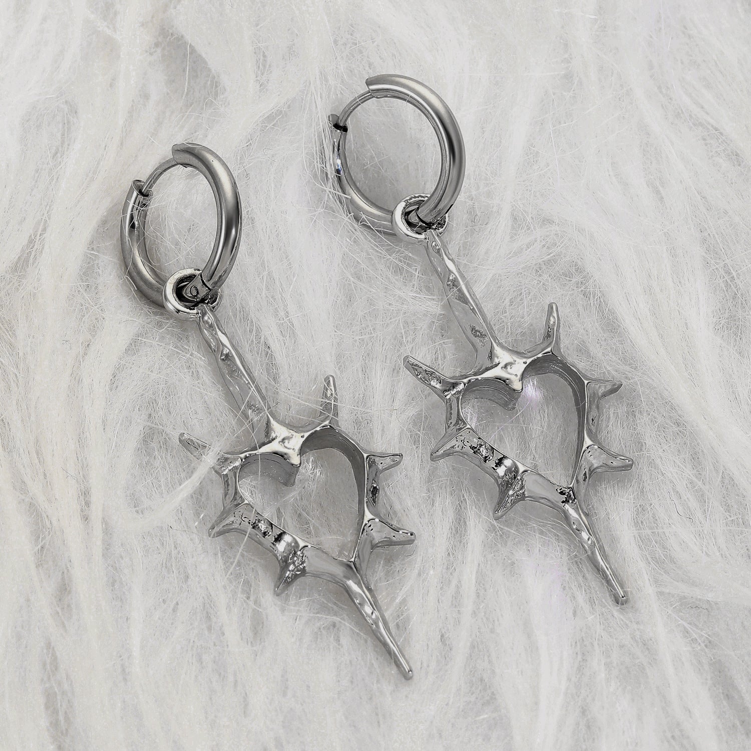 Wholesale Hollow thorn heart earrings
