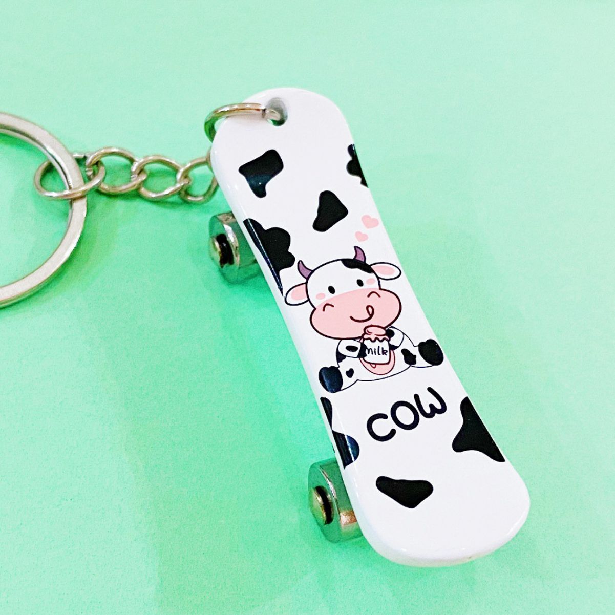 Wholesale Metal Fan Spaceman Cow Cartoon Keychain