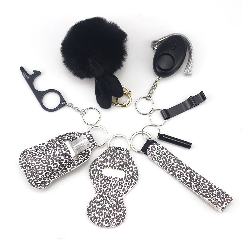 Wholesale Outdoor Whistle Hand Sanitizer Leather Case Fur Ball Key Chain Set