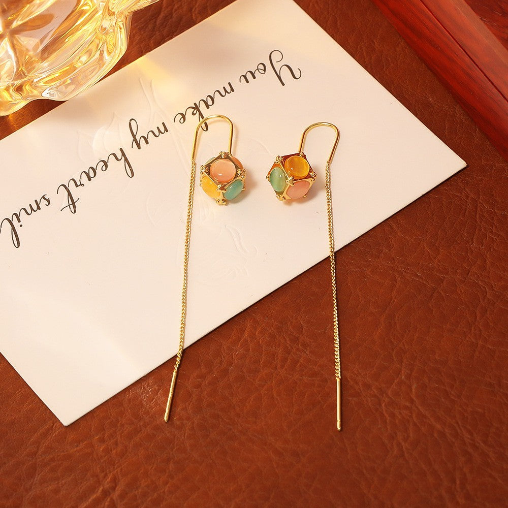 Wholesale Fireworks pearls cat eyes plant studded diamond earrings