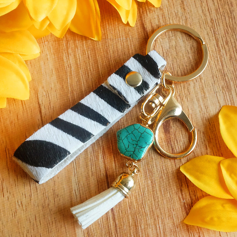 Llavero de estampado de leopar de vaca animal de cuero de cuero al por mayor