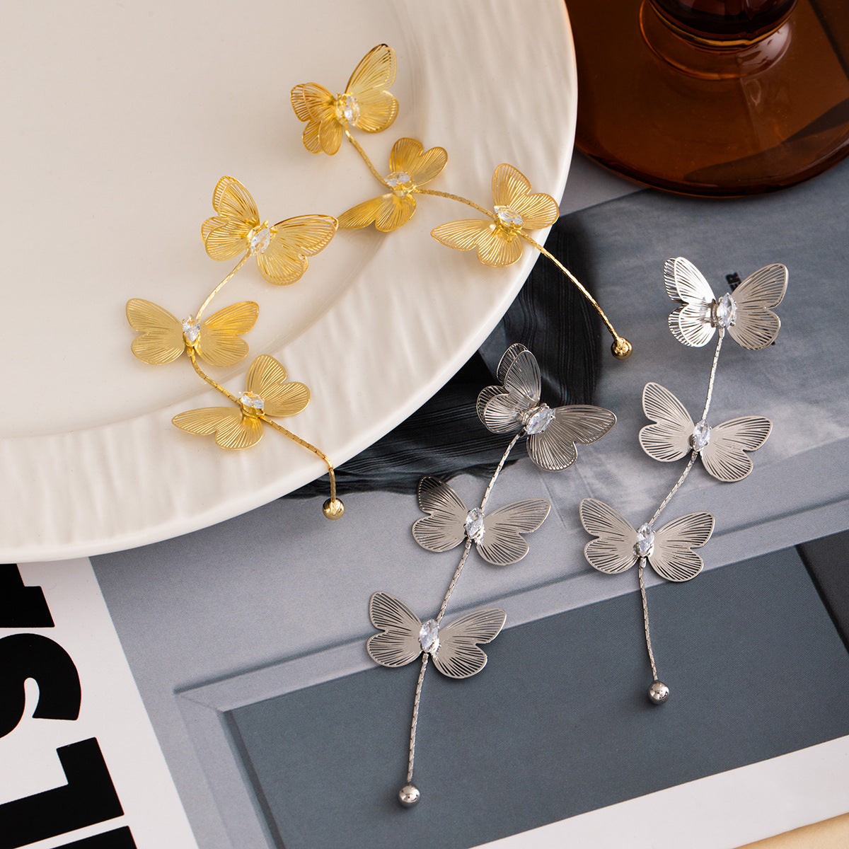 Wholesale Silver Needle Metal Style Three-Dimensional Bow Tassel Earrings