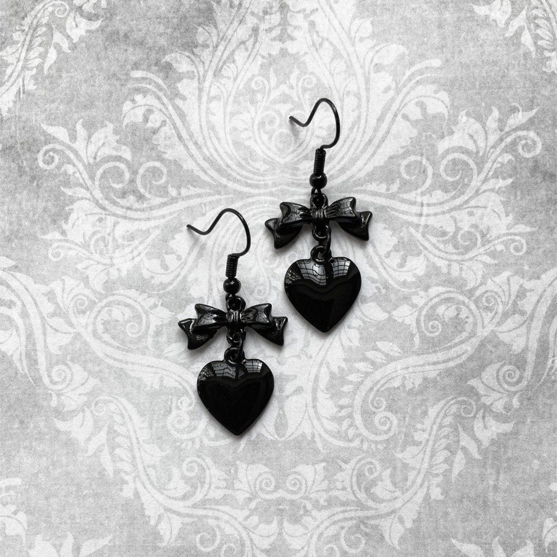 Wholesale Black Heart Shaped Black Bow Alloy Earrings