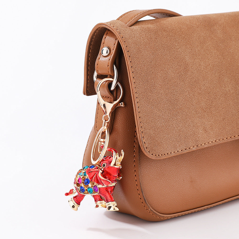 Wholesale Oil dripping 3D elephant inlaid with diamond car keychain