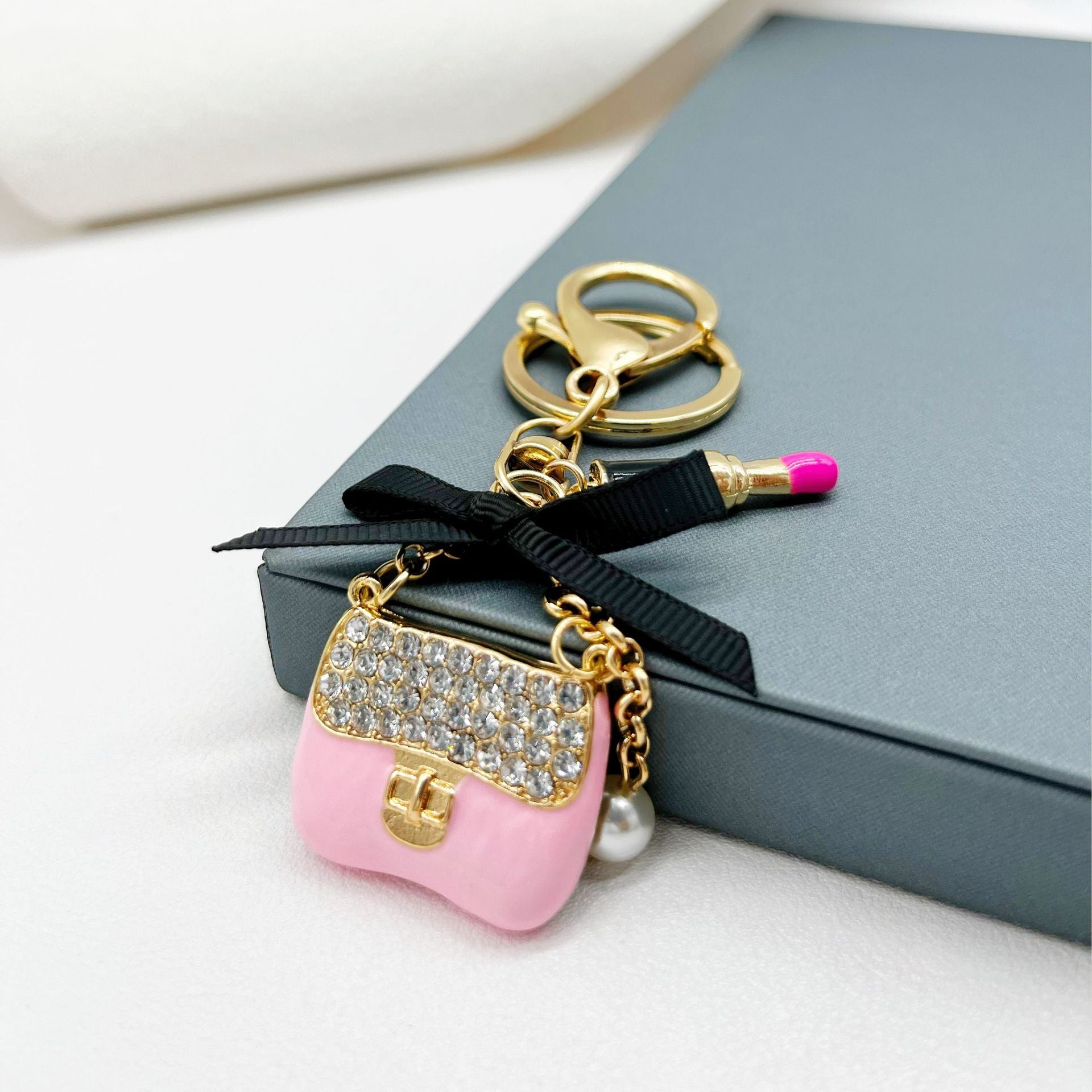 Wholesale Rhinestone Lipstick Bow Small Shoulder Bag Alloy Keychain