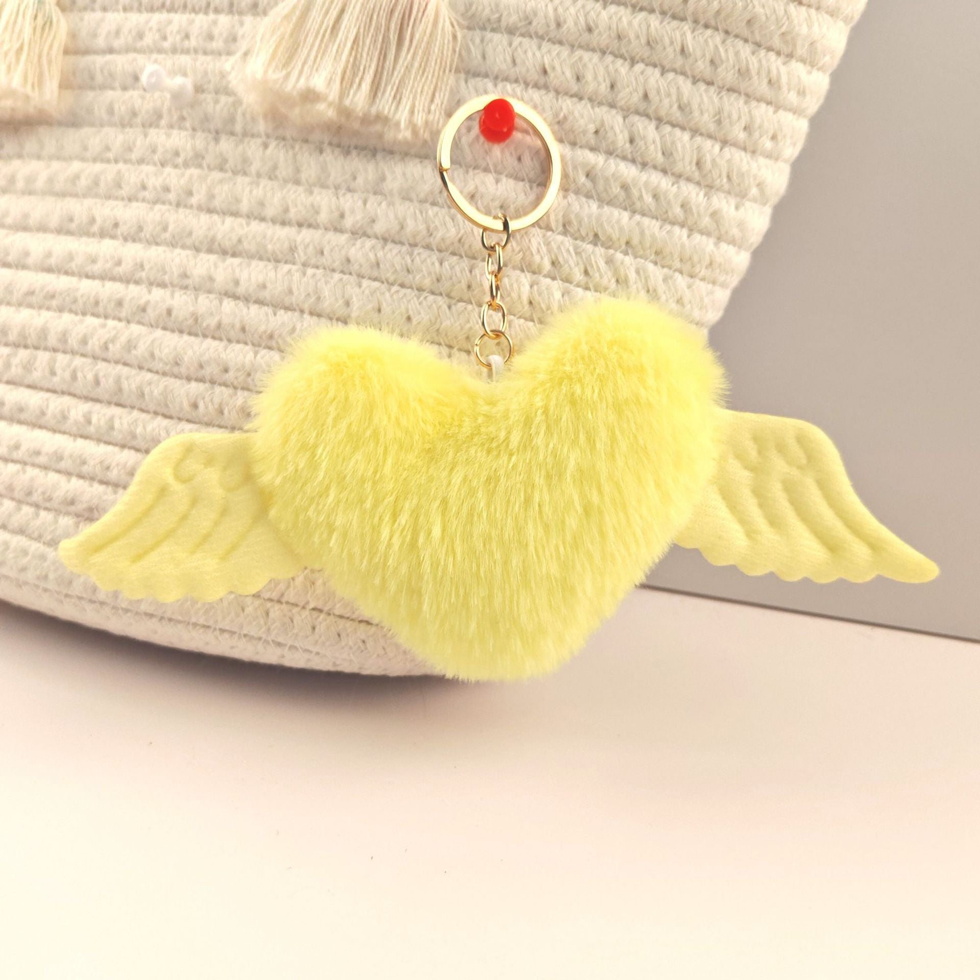 Wholesale Heart wings fur ball keychain