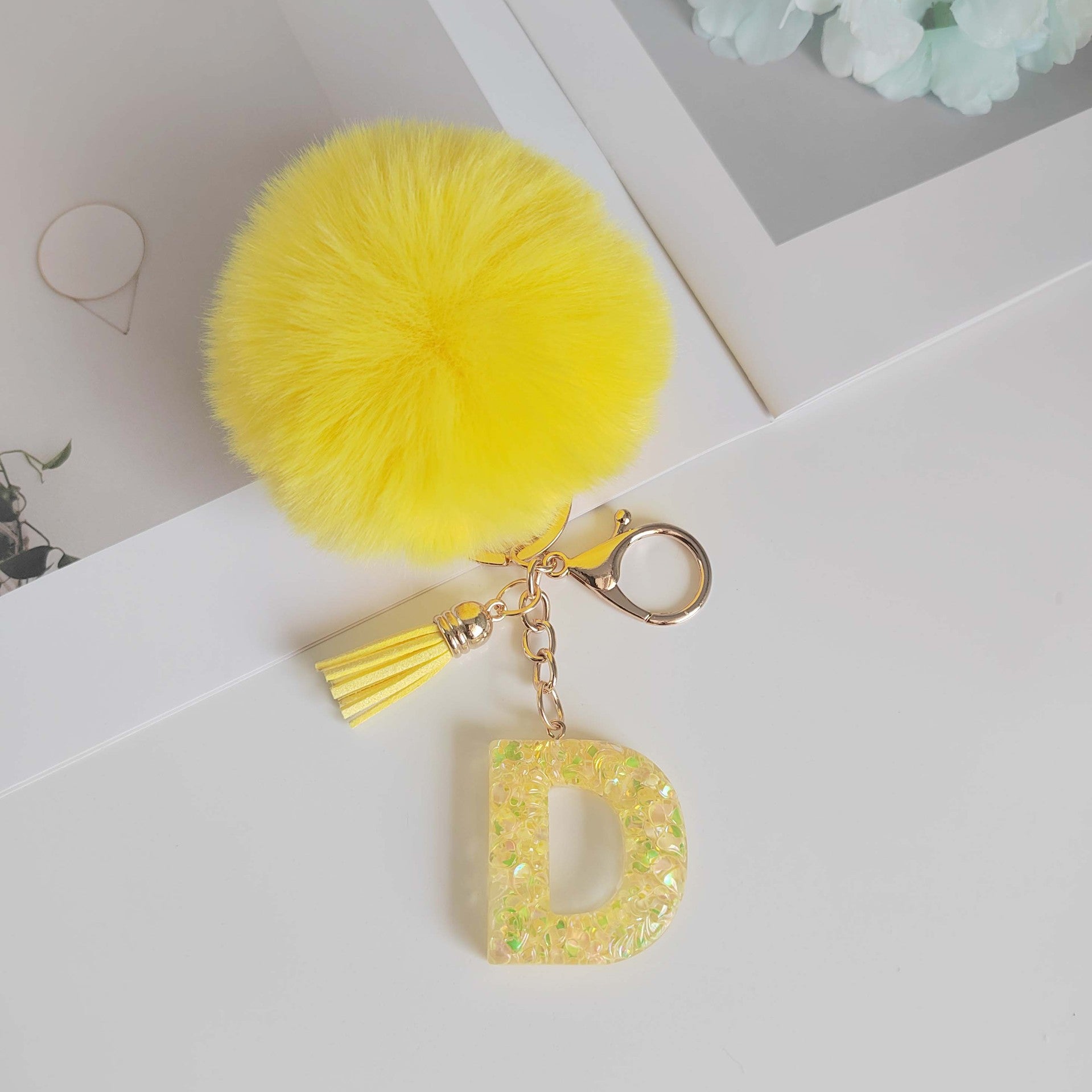 Wholesale Yellow letter ball pendant flower shaped letter keychain