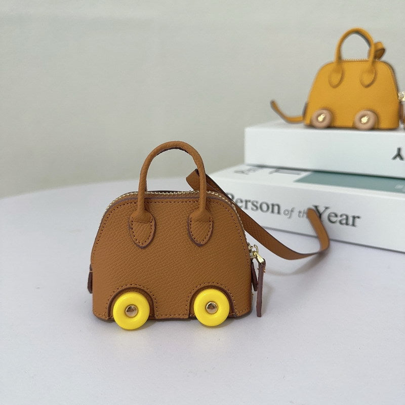 Wholesale Mini wheel shell bag cute lipstick earphone bag