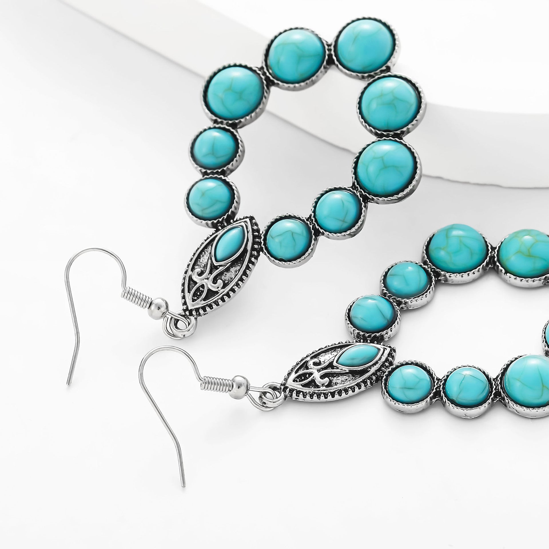 Wholesale Vintage Bohemian Turquoise Drop Shape Hollow Earrings