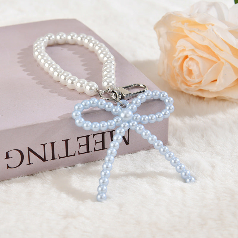 Wholesale Colorful bow cute little hat acrylic keychain