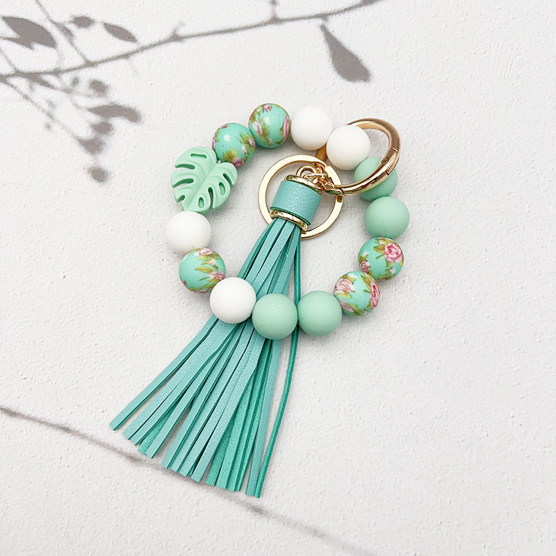 Wholesale leaf silicone printing silicone beaded tassel Wrist keychain