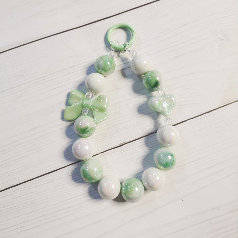 Wholesale Electroplated beaded bow car key chain mobile phone pendant cute candy color paint ring pearl accessories bag