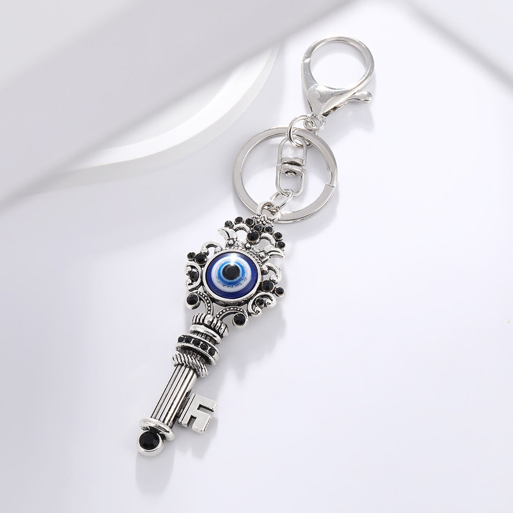 Wholesale Devil' s Eye Key Shape with Water Diamond Metal Keychain