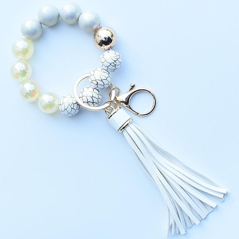 Wholesale Colorful leopard print silicone beaded bracelet keychain PU tassel pendant