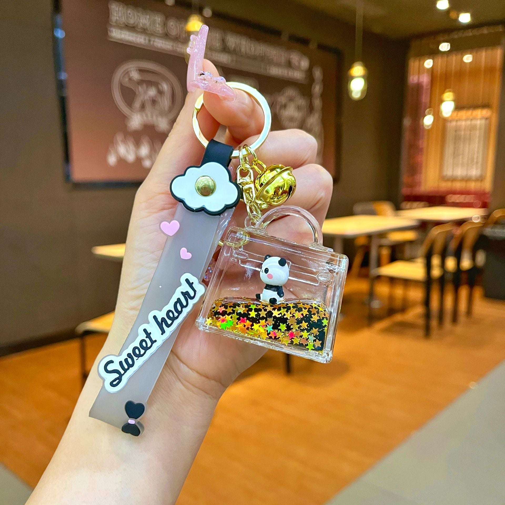 Wholesale Black gold floating cartoon cute panda Liquid Keychains