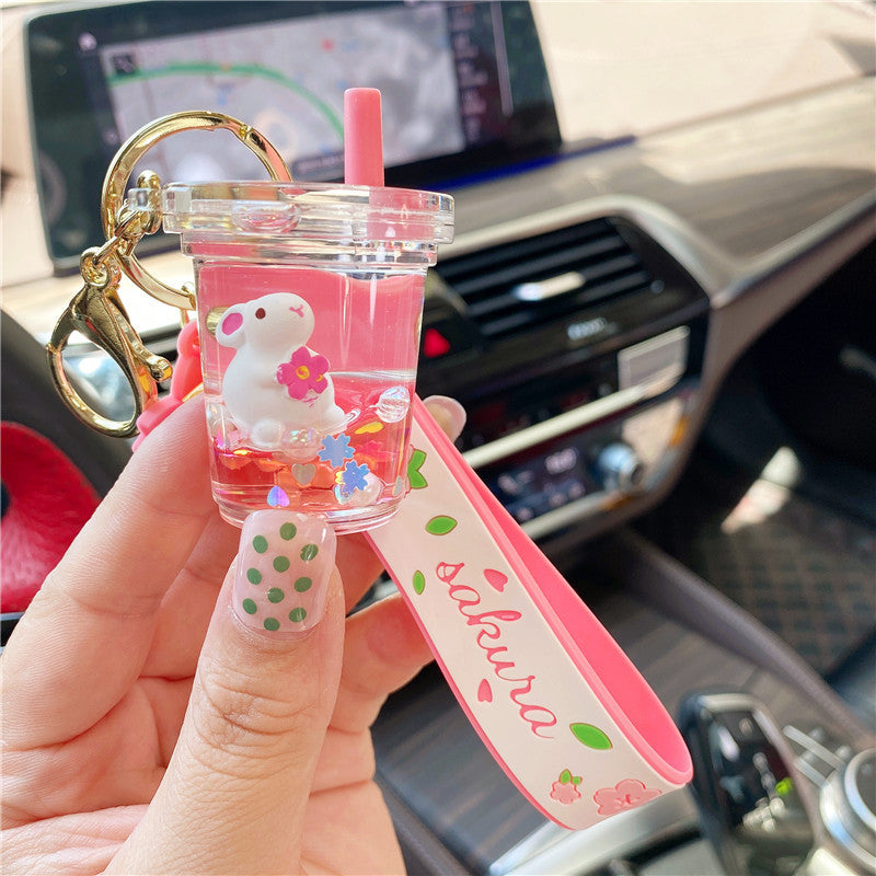 Wholesale Cherry Blossom Bunny Into Oil Milk Tea Cup Floating Bottle Acrylic Keychain
