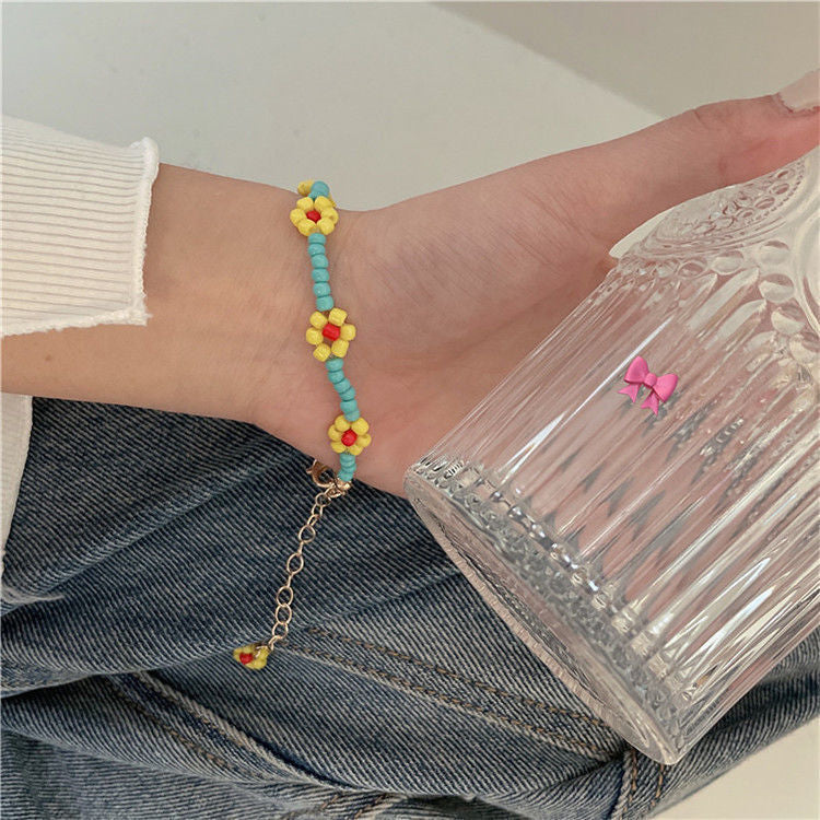 Wholesale Cute Beaded Candy Color Flower Rice Beads Glass Bracelet
