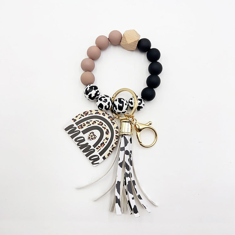 Wholesale Lacquer Round Beads Cow Pattern Wooden Beads Rainbow Wooden Sign Tassel Bracelet Keychain