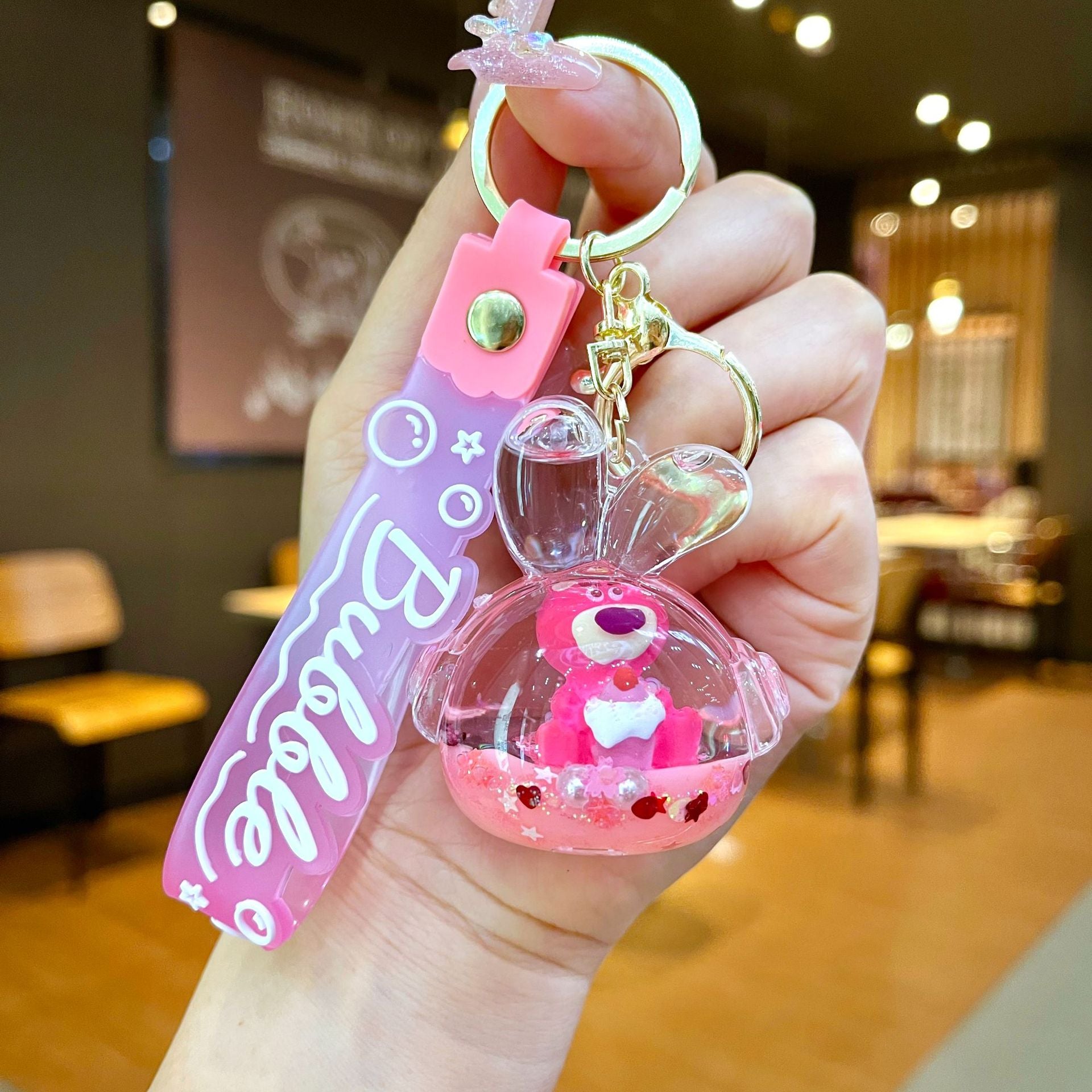 Wholesale Oil filled pink strawberry bear quicksand Keychains