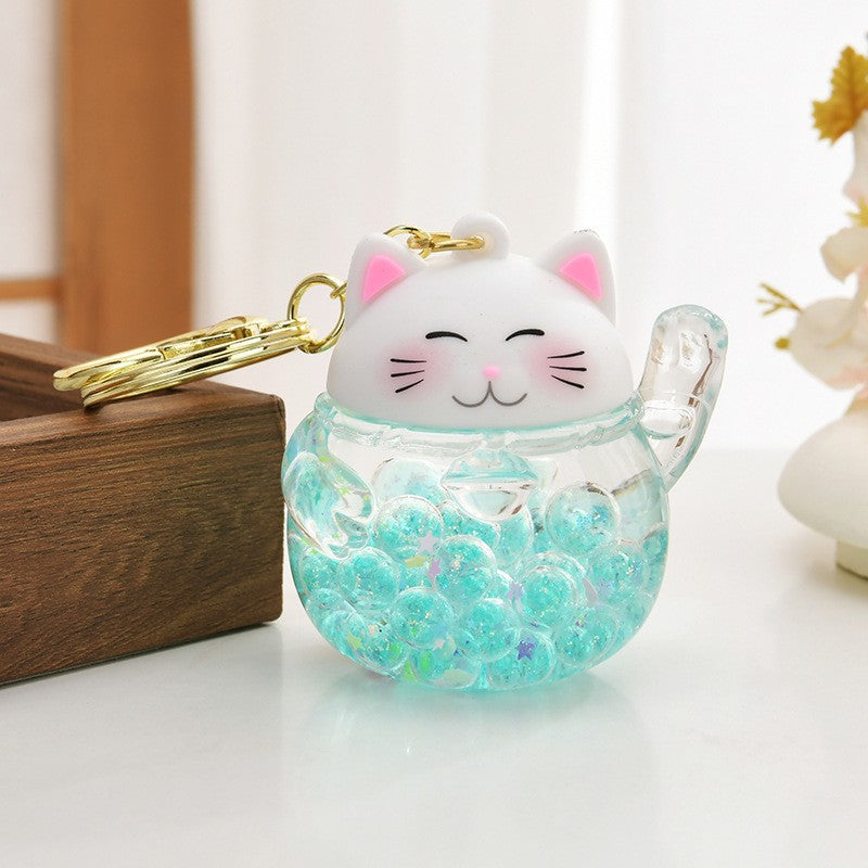 Wholesale Acrylic flowing sand bottle bag keychain