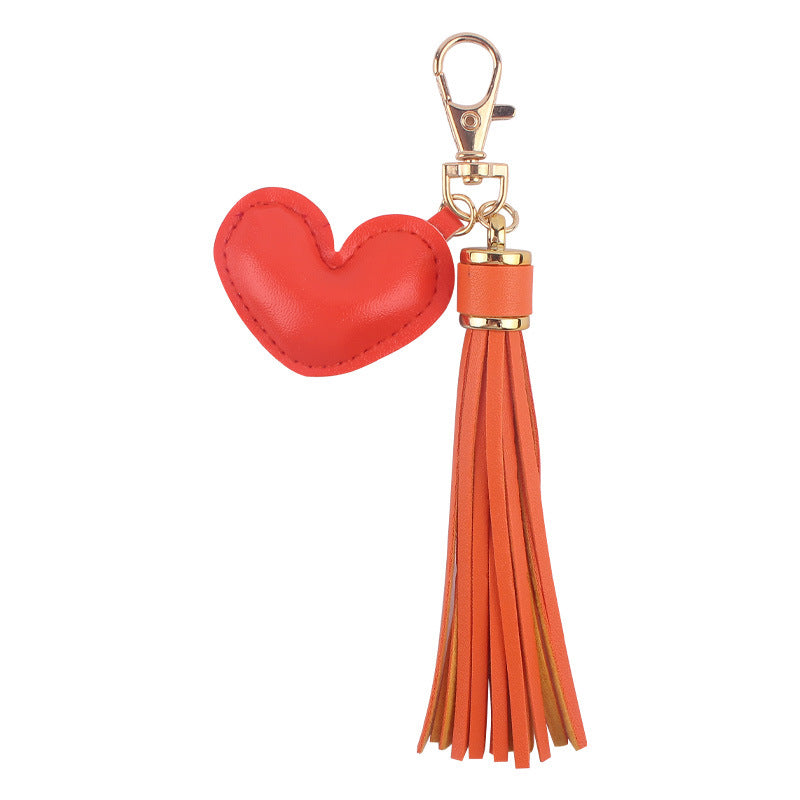 Llavero de borla de cuero de corazón al por mayor
