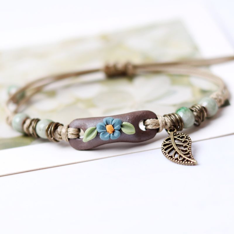 Brazalete de hoja de flores de polo de color de color arcilla al por mayor