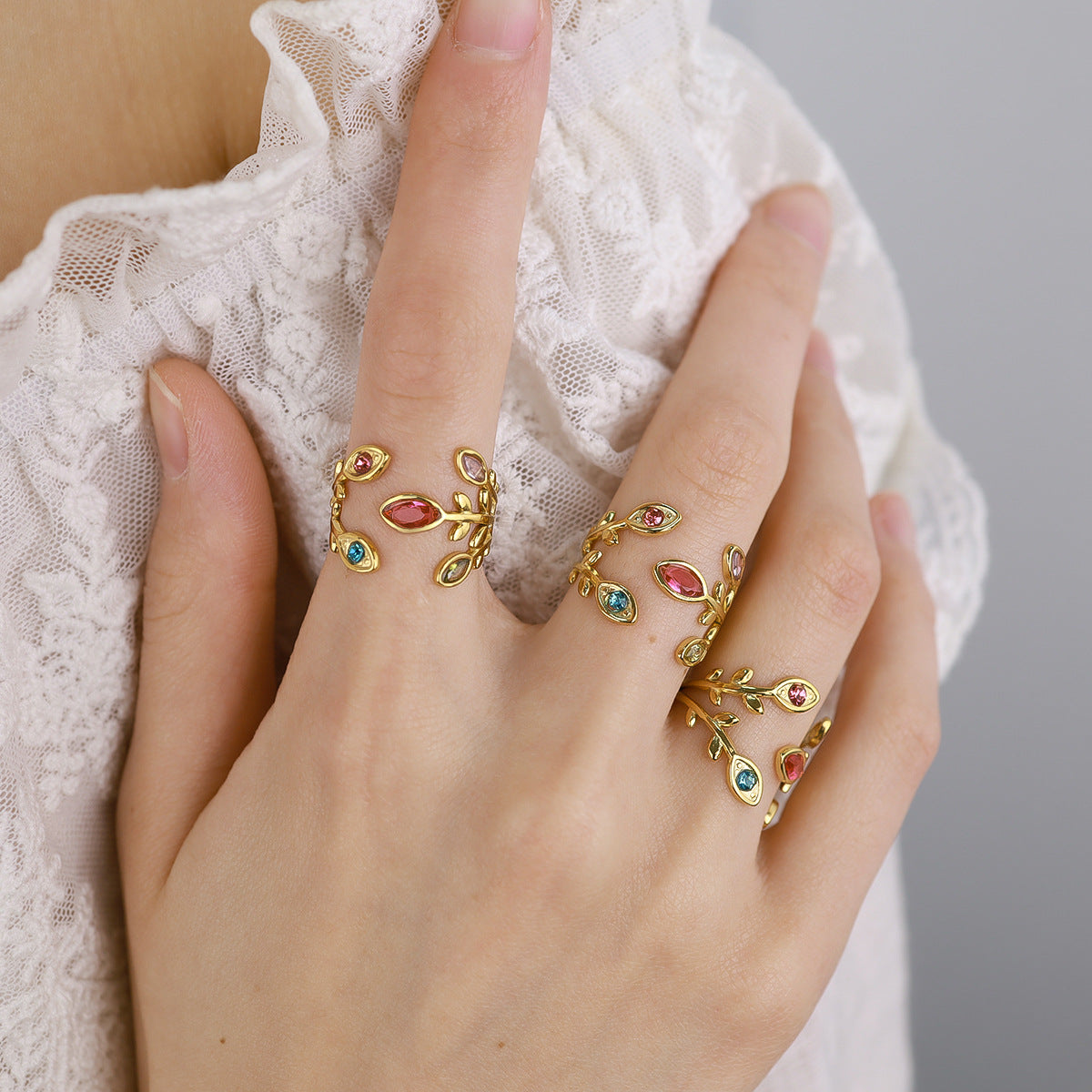 Wholesale rainbow zircon leaf ring women' s 18K gold titanium steel open ring