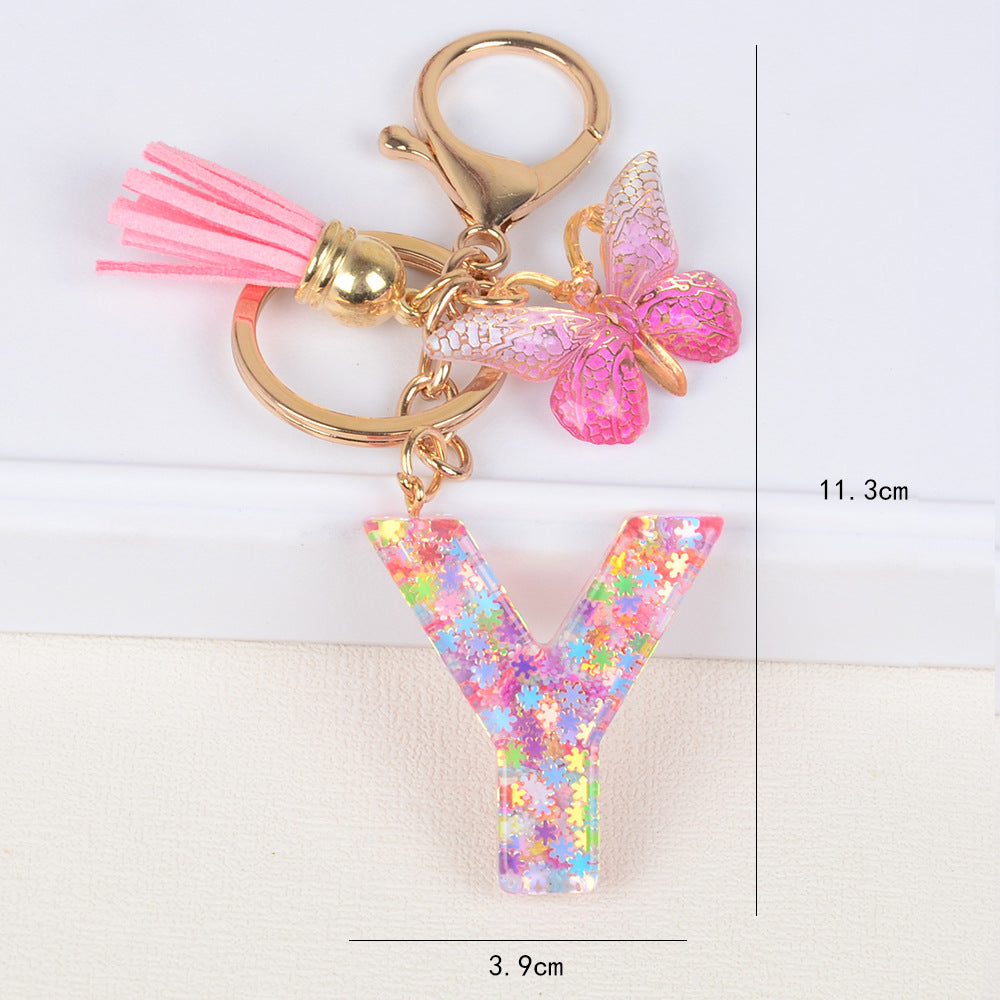 卸売スパンコールスノーフレークレター樹脂キーホルダー