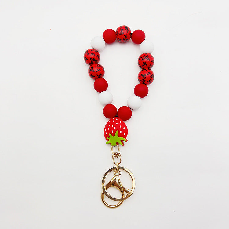 Wholesale Silicone Pumpkin Cow Ghost Dog Paw Wooden Bead Bracelet Keychain