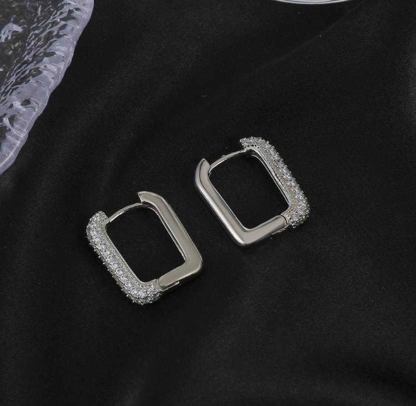 Pendientes geométricos de circón de circón de cobre al por mayor de cobre pendientes geométricos