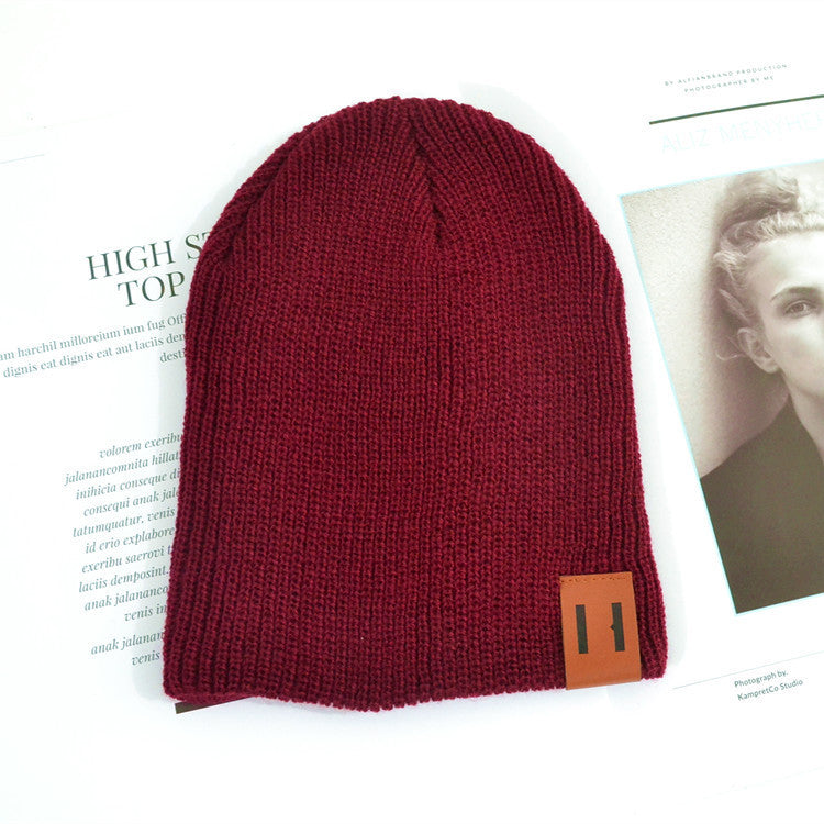 Wholesale Children's Leather Label Warm Ear Protection Knitted Wool Hat