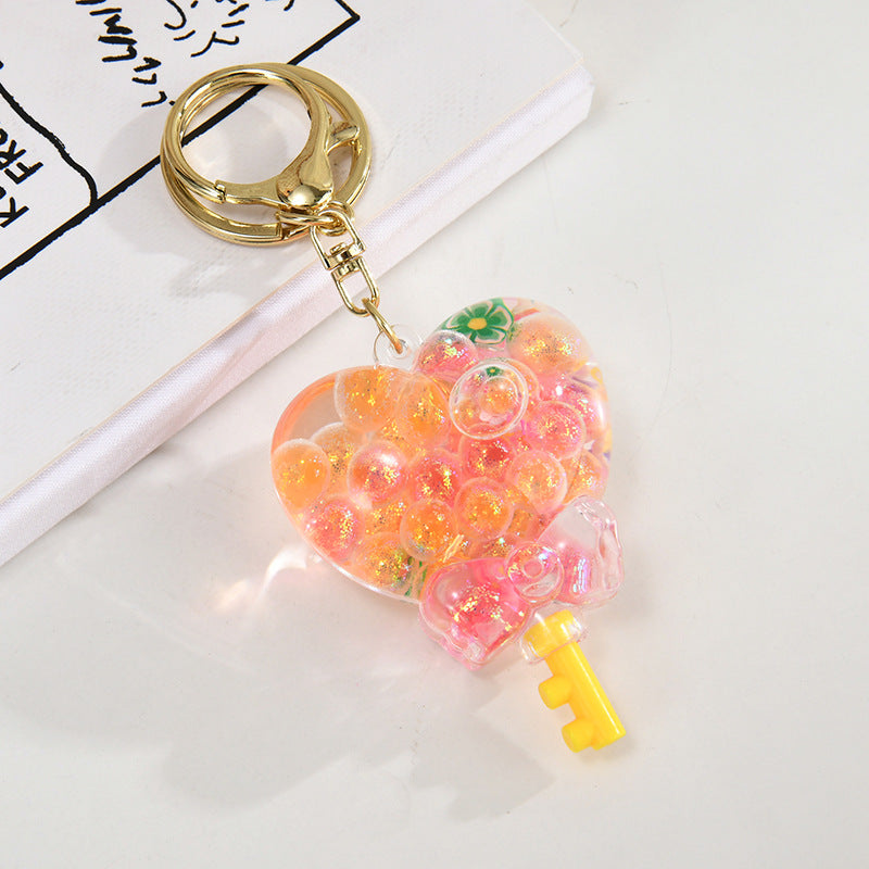 Wholesale Cartoon Oil Flow Sand Bottle Acrylic Keychain Car Keychain