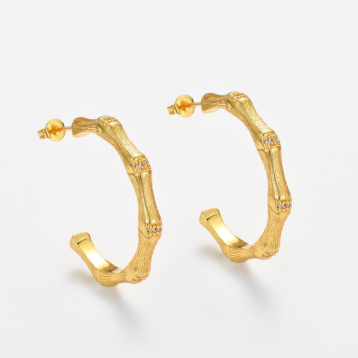 Wholesale Zirconia-set brushed bamboo-shaped earrings for women
