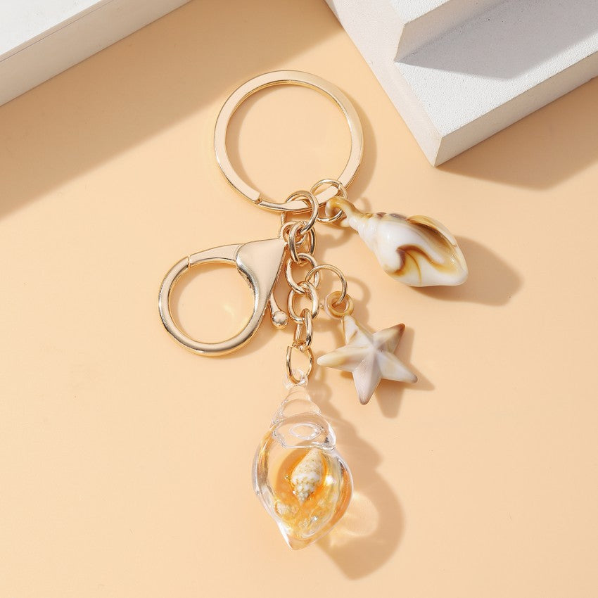 Wholesale Seaside vacation luminous conch Acrylic keychain