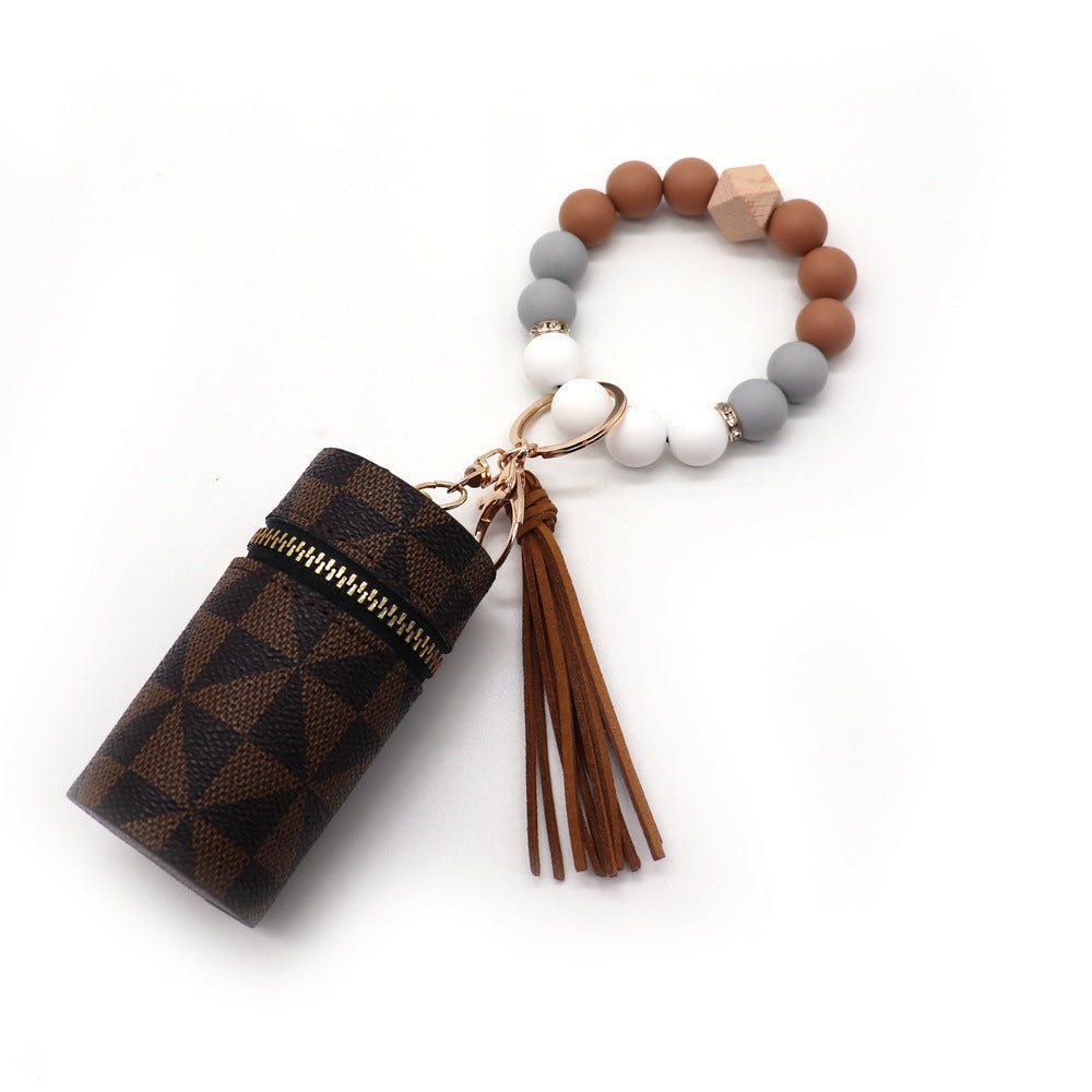 Wholesale Silicone Coin Purse Small Bag Mini Lipstick Earphone Keychain