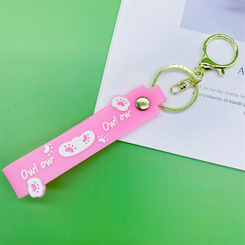 Al por mayor 10pcs PVC Dog Claw Cat Claw Keychain Rope de cuero