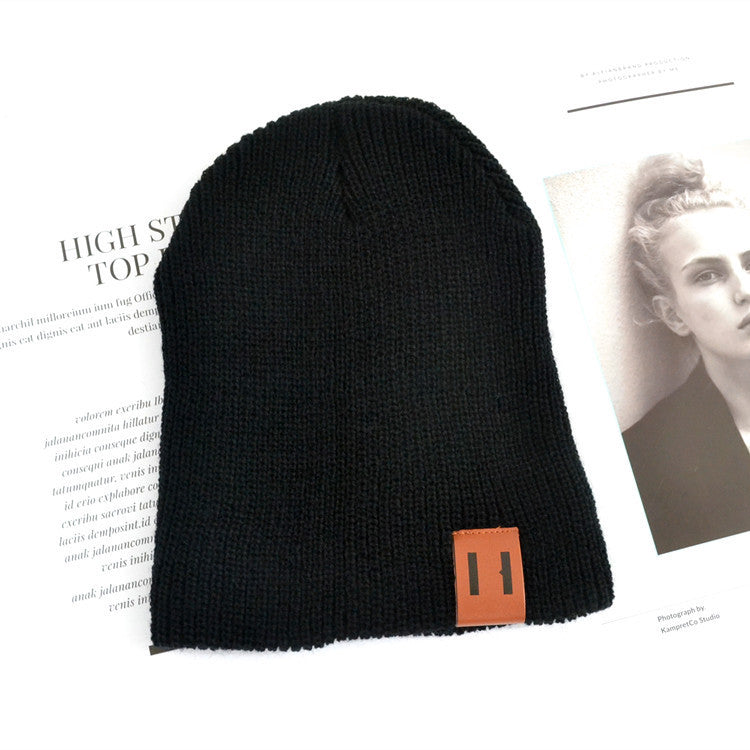 Wholesale Children's Leather Label Warm Ear Protection Knitted Wool Hat