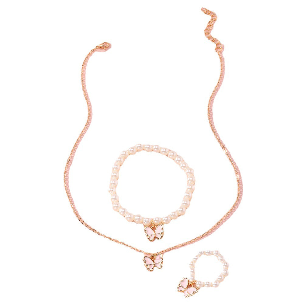 Juego de joyería para niños de perlas al por mayor Aceite de goteo de collares de mariposa rosa rosa