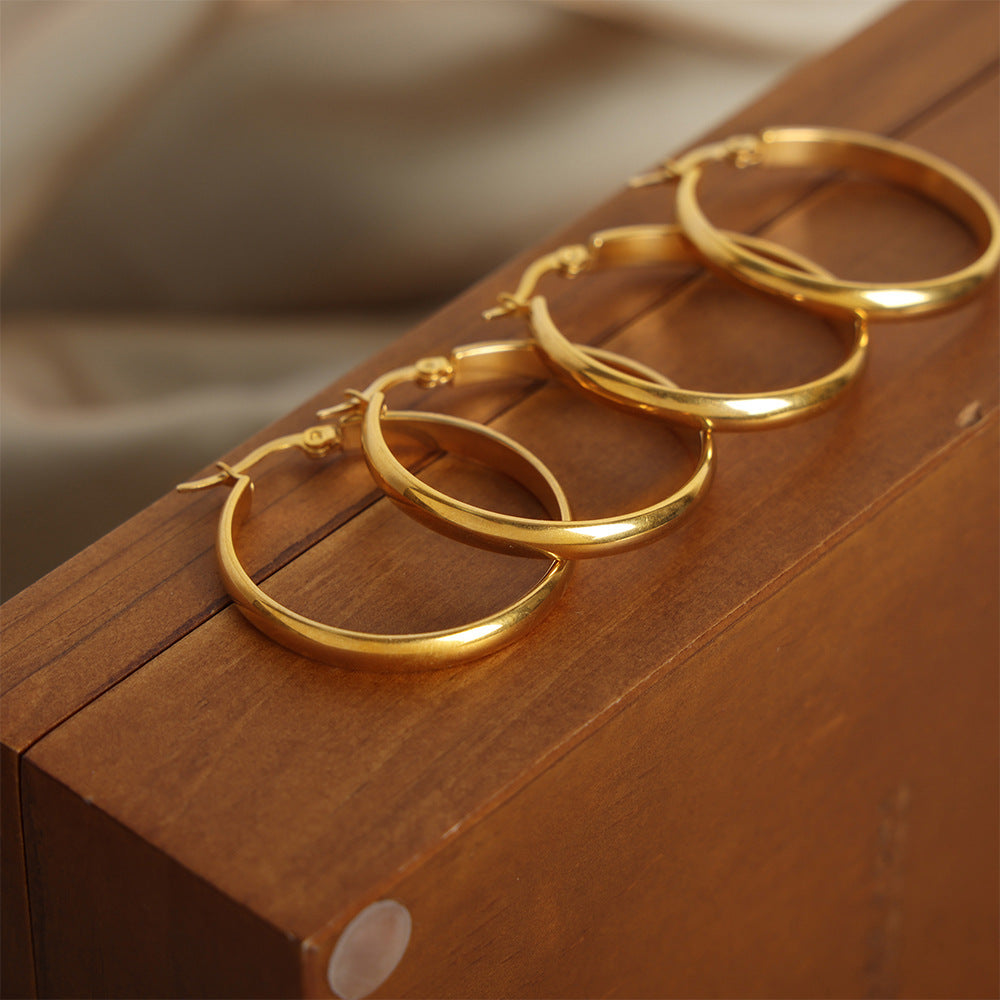 Wholesale Round Titanium Steel Gold-plated Earrings and Earrings