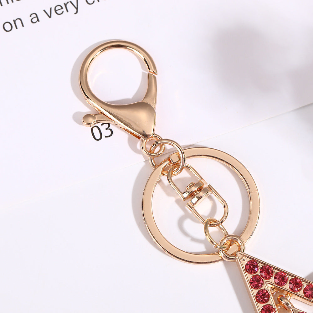 Wholesale Five pointed star hollow diamond inlaid metal keychain