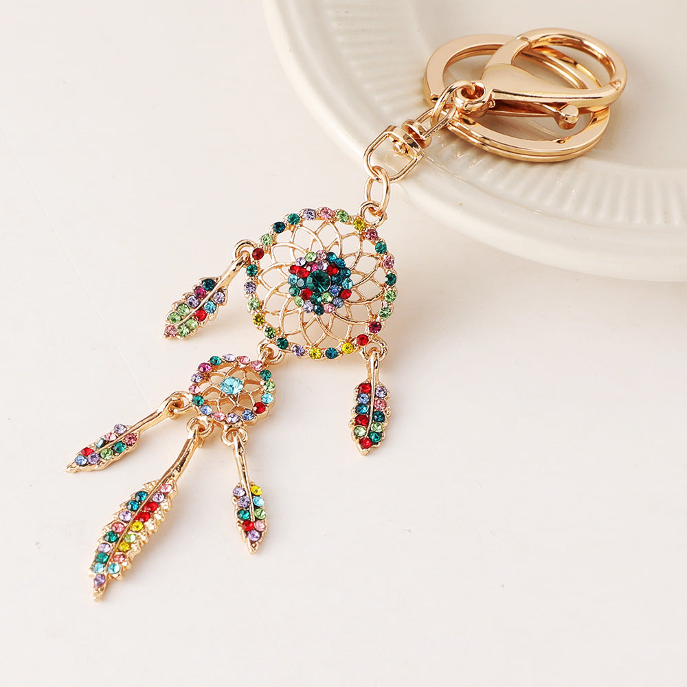 Wholesale Rose gold rhinestone tassel feather dreamcatcher design keychain