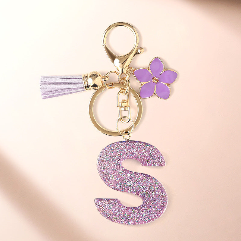 Wholesale Sparkling Pink 26 English Letter Purple Flower Keychain